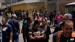 Families gather outside the Boleita National Police detention center after their loved ones were detained in recent days during opposition protests against the official results of the presidential election, in Caracas, Venezuela, Aug. 1, 2024.