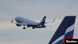 FILE - An Aeroflot Airbus A320-200 aircraft takes off at Sheremetyevo International Airport outside Moscow, Russia June 10, 2018. 