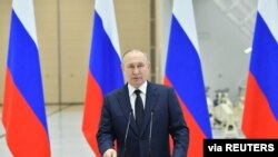 Russian President Vladimir Putin delivers a speech as he visits the Vostochny Cosmodrome in Amur Region, Russia, April 12, 2022. (Sputnik/Evgeny Biyatov/Kremlin via Reuters)