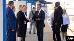 US Secretary of State Antony Blinken (C) is greeted by US Ambassador to Ukraine Bridget Brink (L) as he arrives with British Foreign Secretary David Lammy (R) at Kyiv train station in Kyiv, on September 11, 2024, amid the Russian invasion on Ukraine.