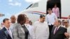 (FILES) This handout picture released by the Venezuelan Presidency shows Venezuela's President Nicolas Maduro (C) talking with Prime Minister of Saint Vincent and the Grenadines Ralph Everard Gonsalves (R) upon landing at Argyle International Airport in A