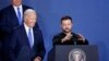 Ukraine's President Volodymyr Zelensky speaks alongside US President Joe Biden during a Ukraine Compact initiative on the sidelines of the NATO Summit at the Walter E. Washington Convention Center in Washington, DC, on July 11, 2024. (Photo by Ludovic MAR