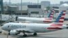 Foto Achiv: Avyon American Airlines yo prepare pou yo dekole nan ayewopo Logan nan vil Boston, Massachusetts, 21 Jiye, 2021.