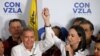 Venezuelan opposition leader Maria Corina Machado talks to the media, accompanied by opposition presidential candidate Edmundo Gonzalez Urrutia, following the presidential election results in Caracas on July 29, 2024.