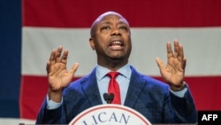 (FILES) US Senator and 2024 Republican Presidential hopeful Tim Scott speaks at the Republican Party of Iowa's 2023 Lincoln Dinner at the Iowa Events Center in Des Moines, Iowa, on July 28, 2023.