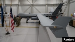 FILE PHOTO: A U.S. Air Force MQ-9 Reaper drone sits in a hanger at Amari Air Base