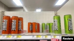 Prime energy drink cans sit on a shelf at Target in Brooklyn, New York